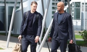 真人娱乐-图片报：拜仁全队返回慕尼黑时神情严峻，仅埃贝尔一人露出笑容